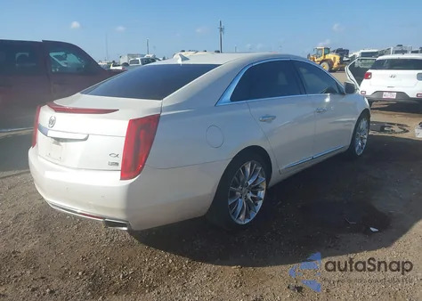 2014 Cadillac Xts Platinum z USA, uszkodzony, nr VIN 2G61S5S39E9139031